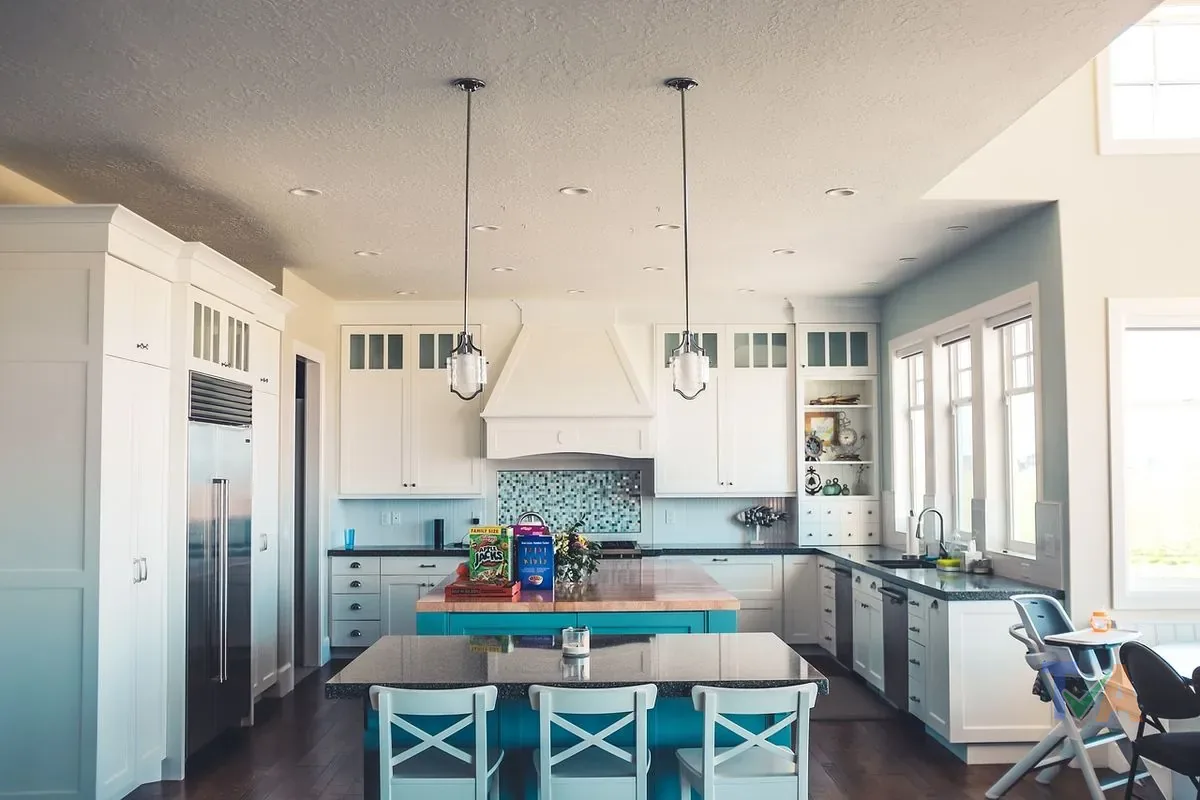 Modern kitchen renovation with island benchtop and stone countertop